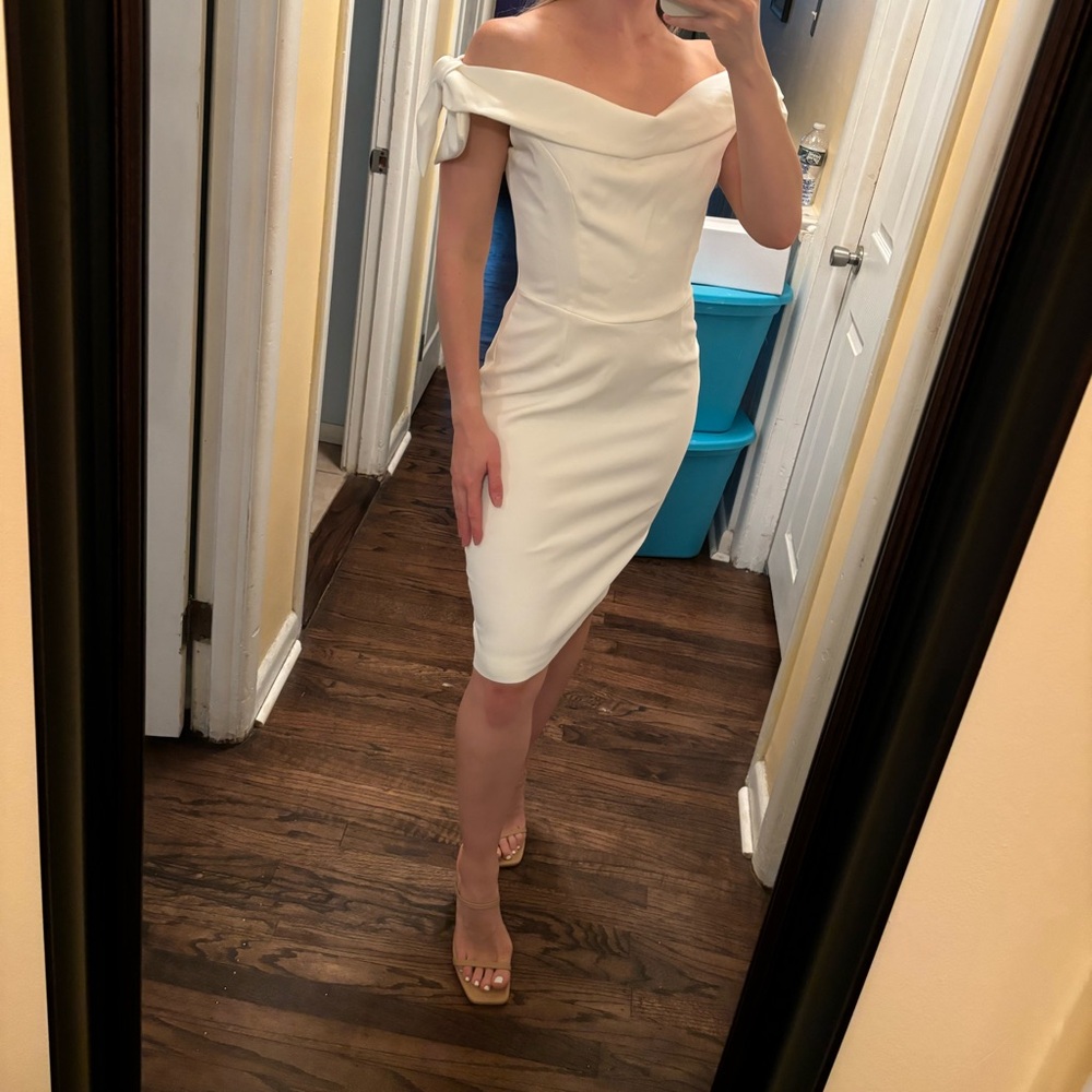 The Pretty Dress Company classy and elegant white midi off the shoulder dress